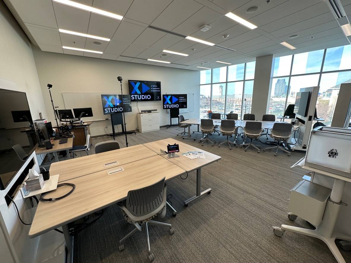 X&#62;STUDIO Space in Consumers Energy includes 2 Breakout Tables and 3 Display Screens